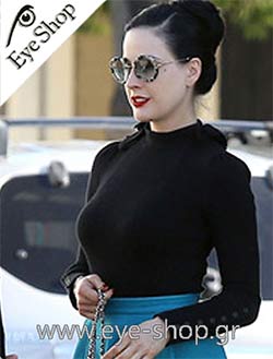  Dita-Von-Teesen con occhiali da sole Miu Miu 04LV