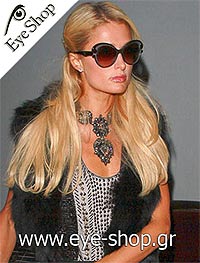  Paris-Hilton con occhiali da sole Prada 28NS