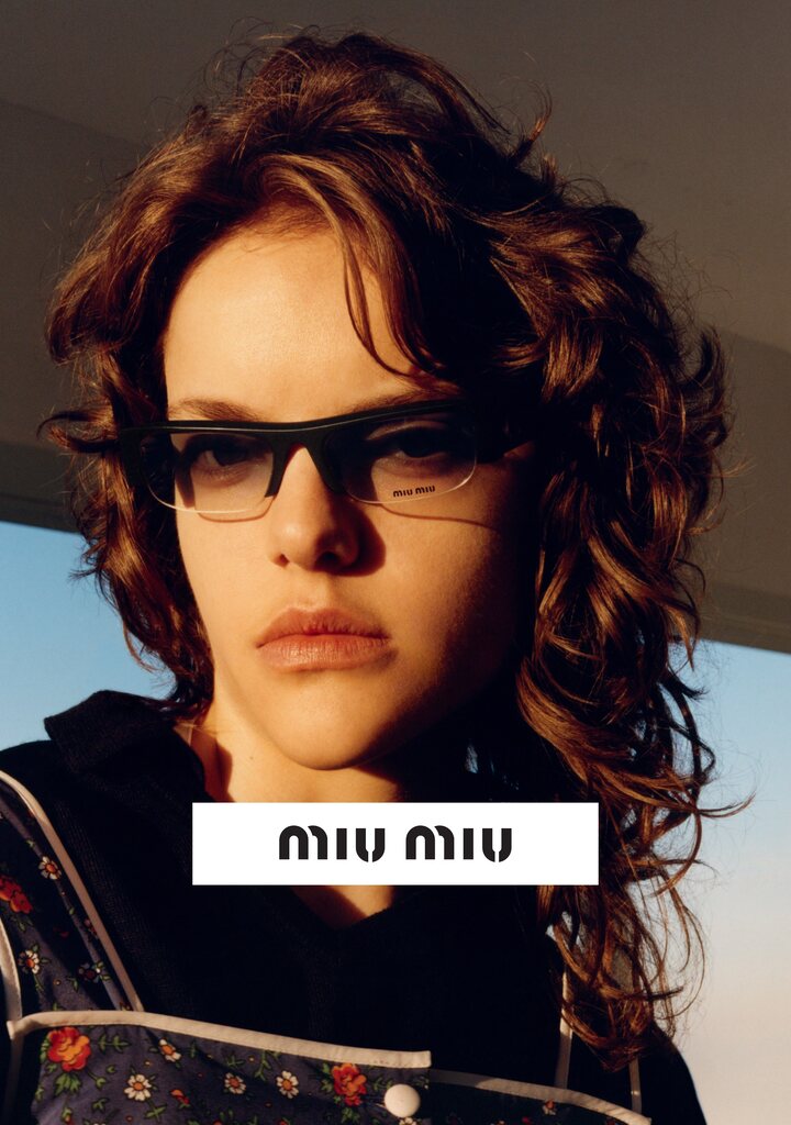 Miu Miu — occhiali da sole oval con montatura in acetato tortoise, Eye-Shop