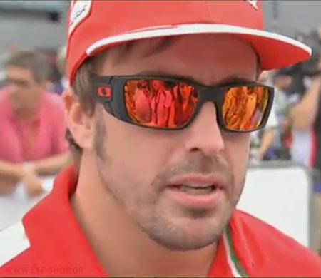 Fernando Alonso wearing Oakley Scuderia Ferrari sunglasses                                                                                                                                                                                                 — OAKLEY