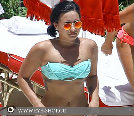 Demi Lovato lounges out wearing Rayban shades                                                                                                                                                                                                              — RAYBAN