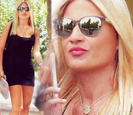 Fei Skorda wearing Carrera Sunglasses                                                                                                                                                                                                                      — CARERA